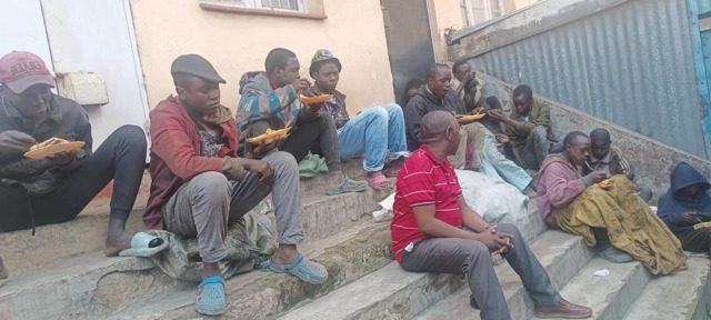 Pastor Kimiit with street boys